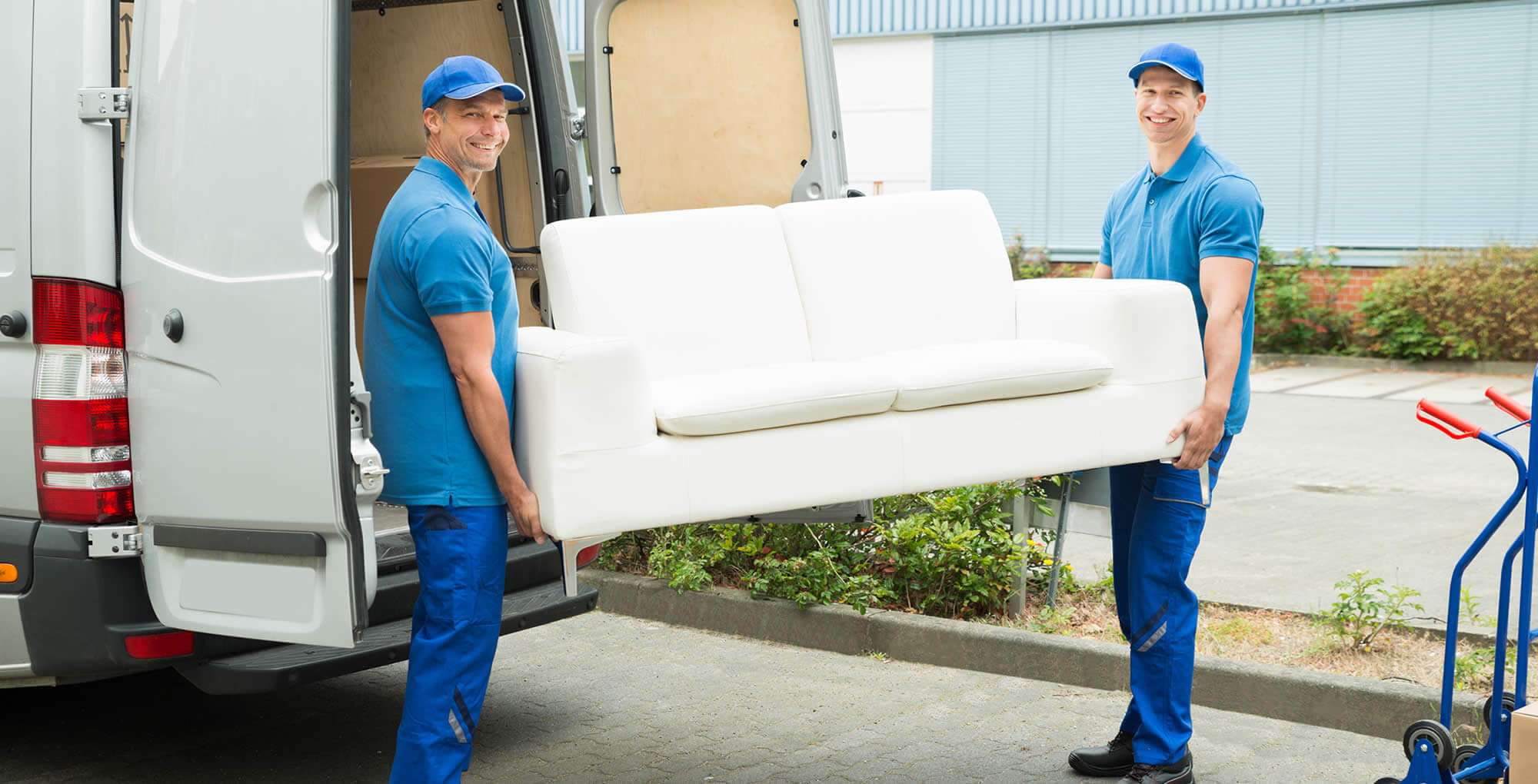 Packed moving boxes and household furniture prepared for relocation